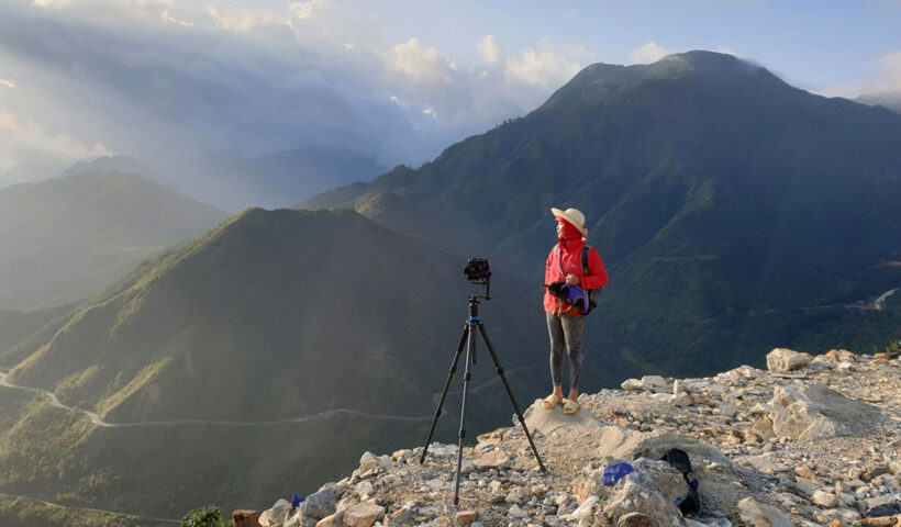 Photographer Using Tripod