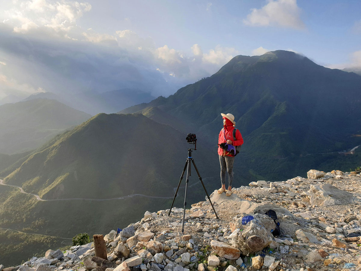 Photographer Using Tripod